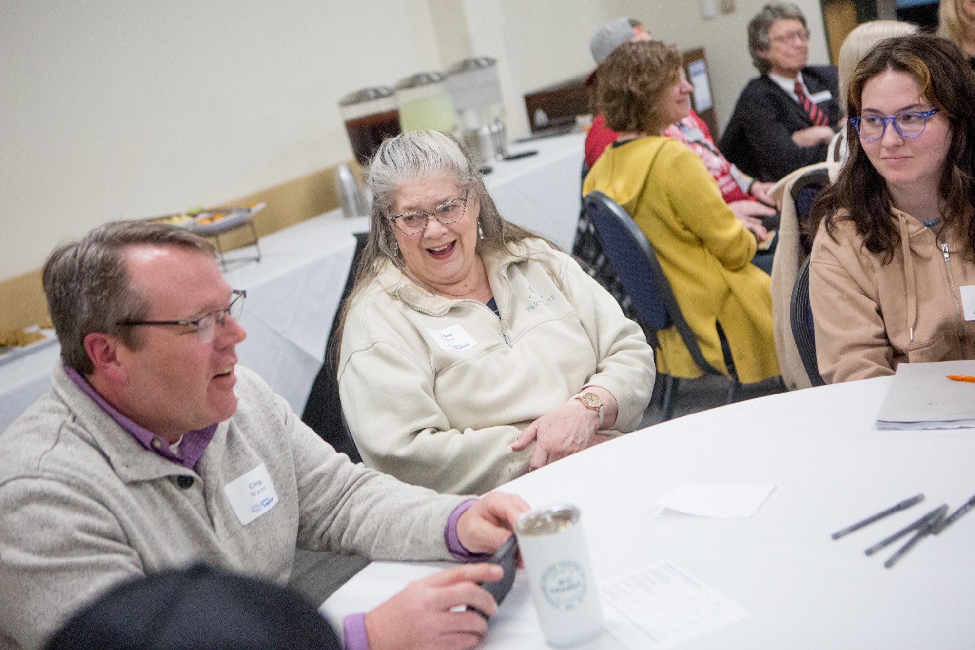 people talking at table